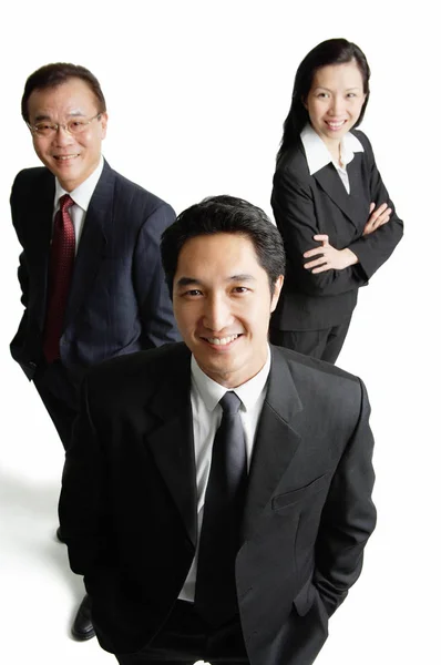 Business executives in formal suits — Stock Photo, Image