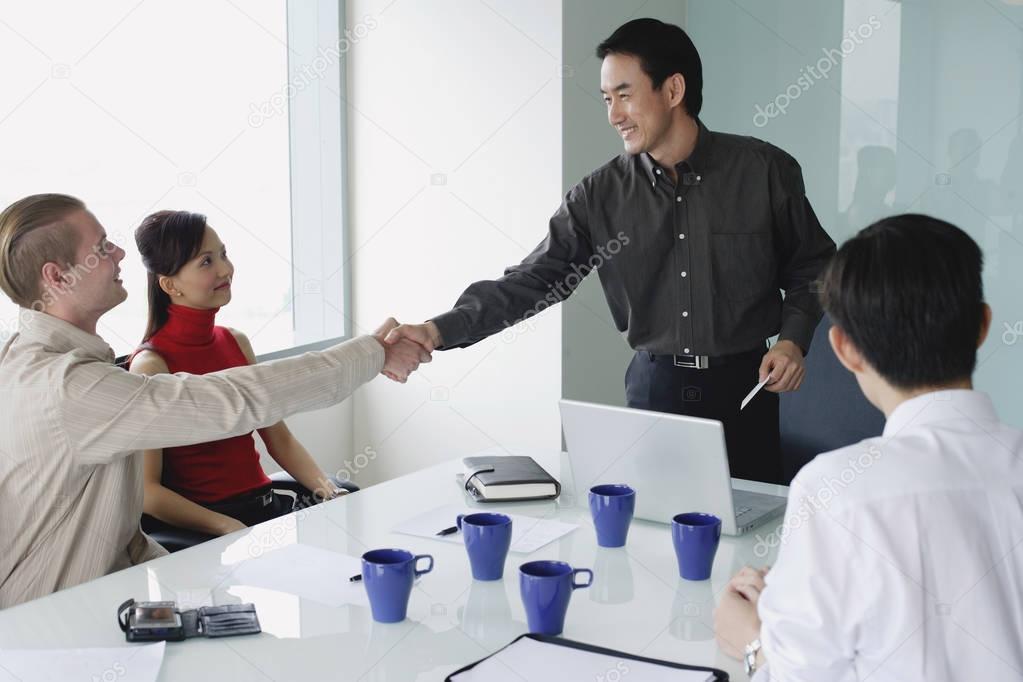 Executives in meeting room