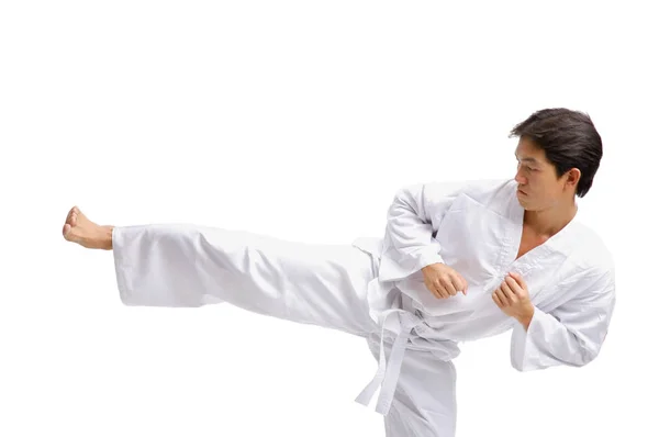 Jovem vestindo uniforme de artes marciais — Fotografia de Stock