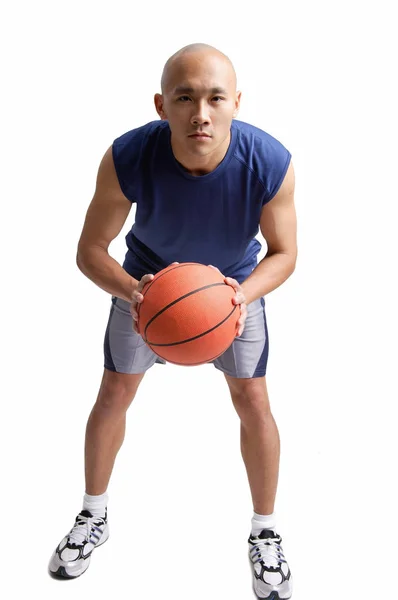 Man holding basketball — Stock Photo, Image