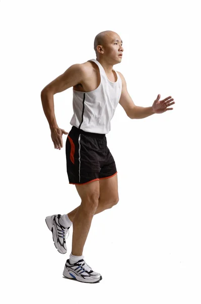 Молодой человек бежит — стоковое фото