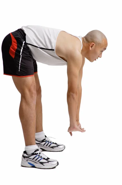 Homem fazendo exercício de alongamento — Fotografia de Stock