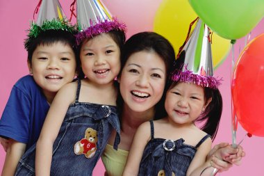 Mother and children with balloons clipart