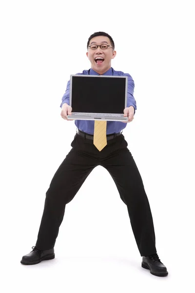 Affärsman bära laptop — Stockfoto