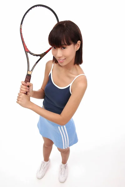 Νεαρή γυναίκα με ρακέτα του τένις — Φωτογραφία Αρχείου