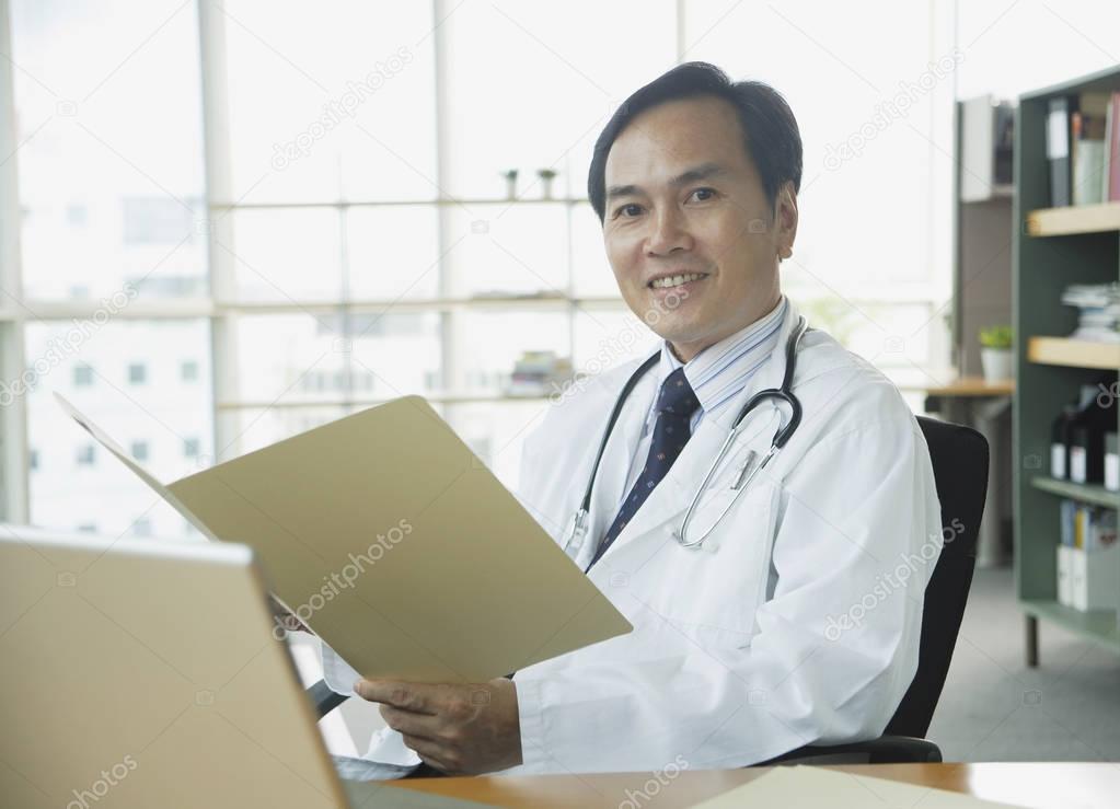 Doctor sitting in office