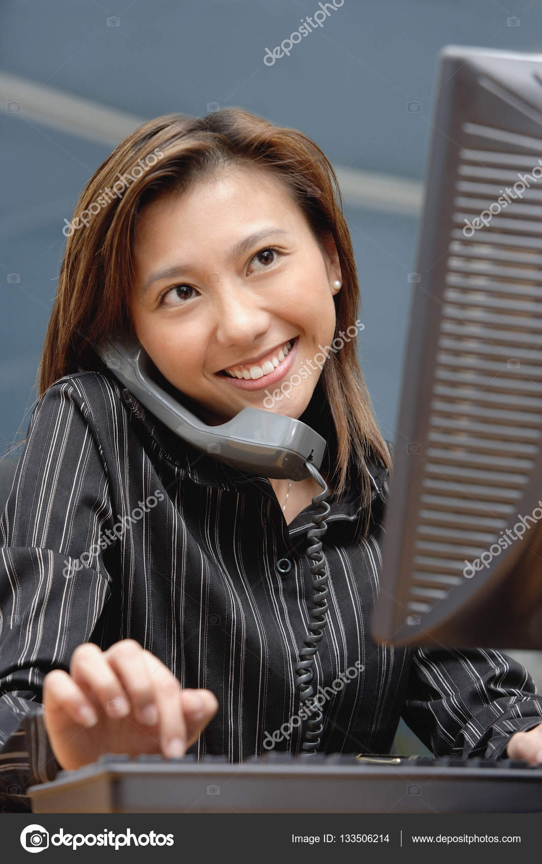 Female executive at desk Stock Photo by ©MicrostockAsia 133506214