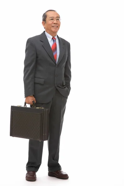 Бізнесмен стоїть з портфелем — стокове фото
