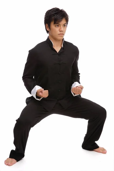 Man in martial arts position — Stock Photo, Image