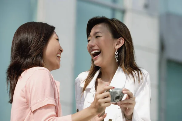 Two women laughing