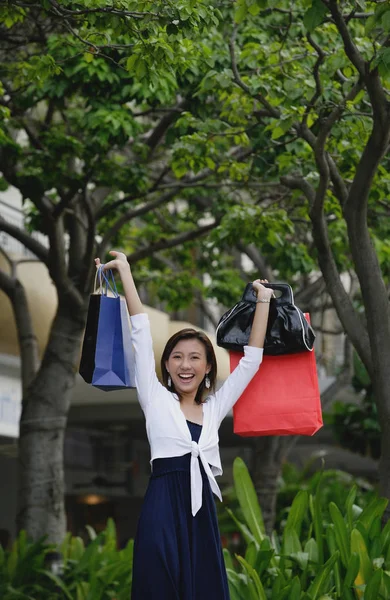 Woman with shopping bags