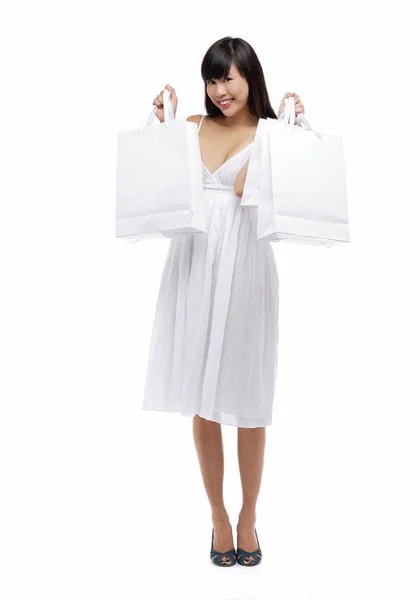 Kvinne i hvit kjole – stockfoto