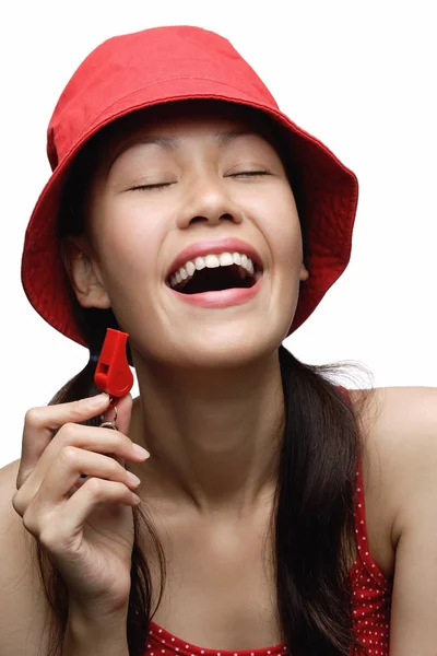 Young woman wearing red hat — Stock Photo, Image