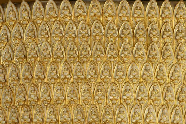 Golden Buddhas sitting in lotus — Stock Photo, Image