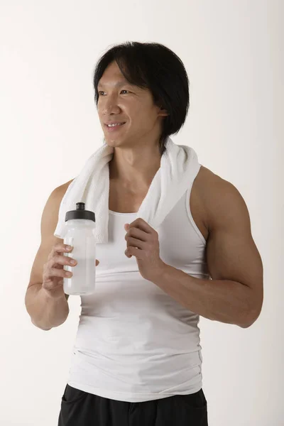 Asiatiska Man efter träningspass — Stockfoto