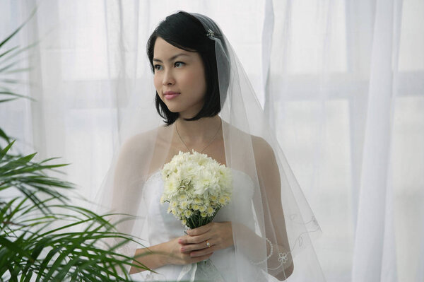 Bride with a bouquet of flowers