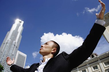 A man in a suit with a skyscraper  clipart