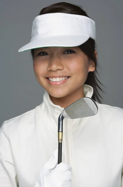 Frau im Golf-Outfit — Stockfoto