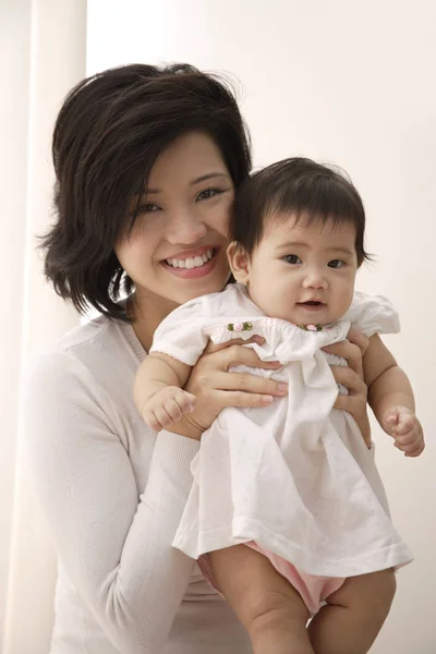 Mujer con niña — Foto de Stock