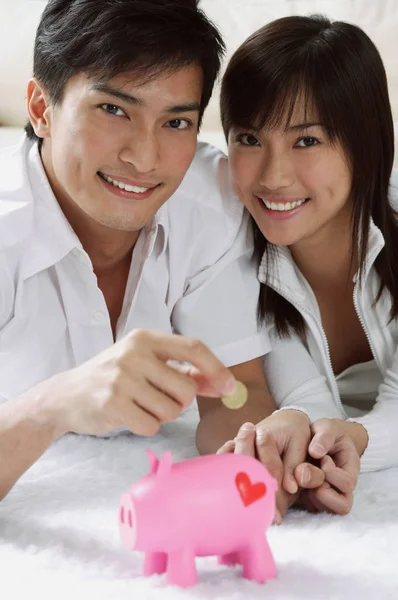 couple with piggy bank