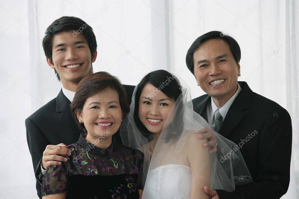newlywed couple and family