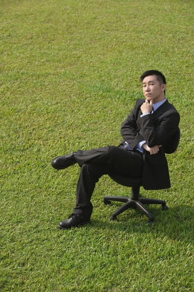 Businessman sitting on office chair