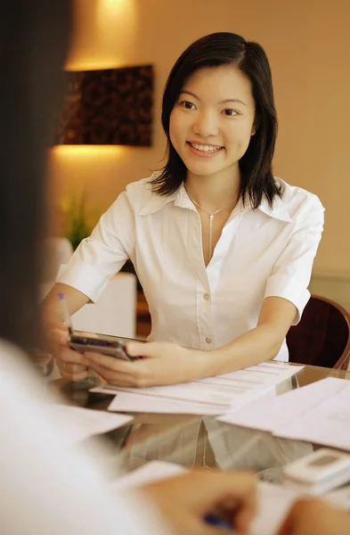 Female executive smiling — Stock Photo, Image