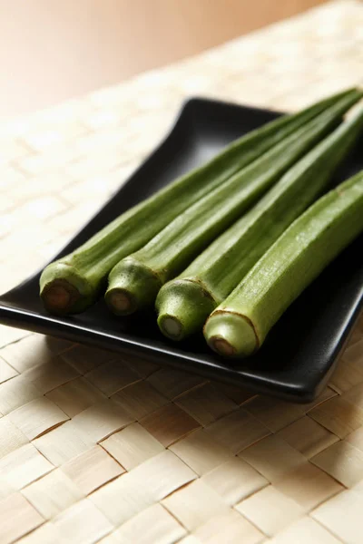 Okra or lady fingers on plate — Stock Photo, Image