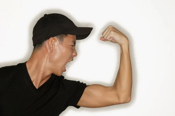 Hombre Flexing Músculos —  Fotos de Stock