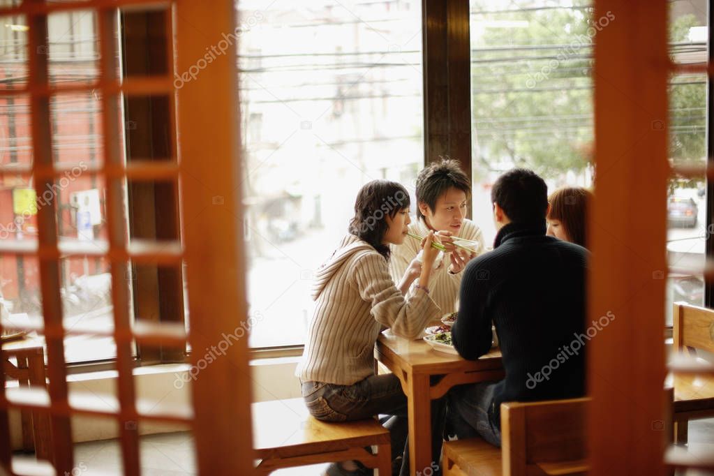 Young couples eating