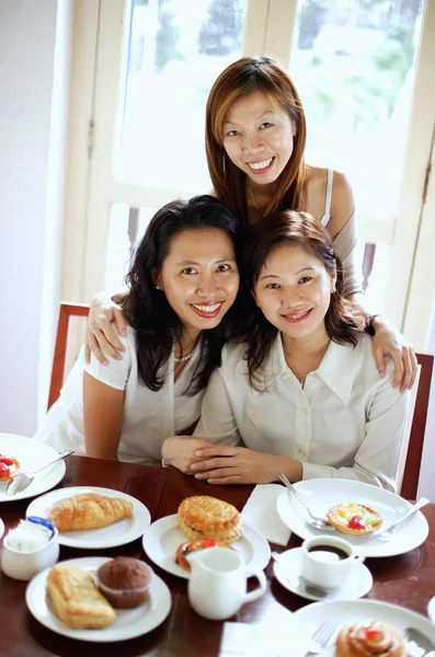 Three women in cafe — Stock Photo, Image