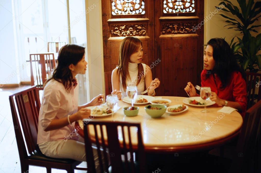 Three women at restaurant
