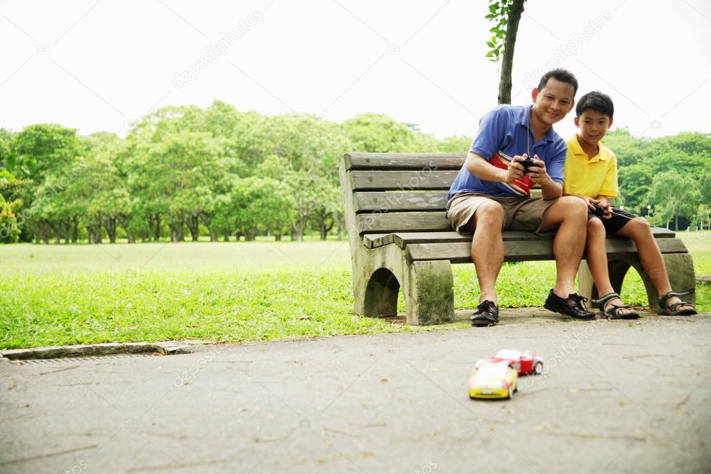 Father and son playing