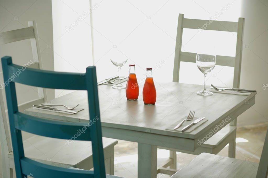 Table and chairs in restaurant 