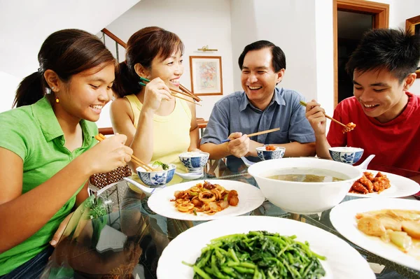 Happy asian Family with food — Stock Photo, Image