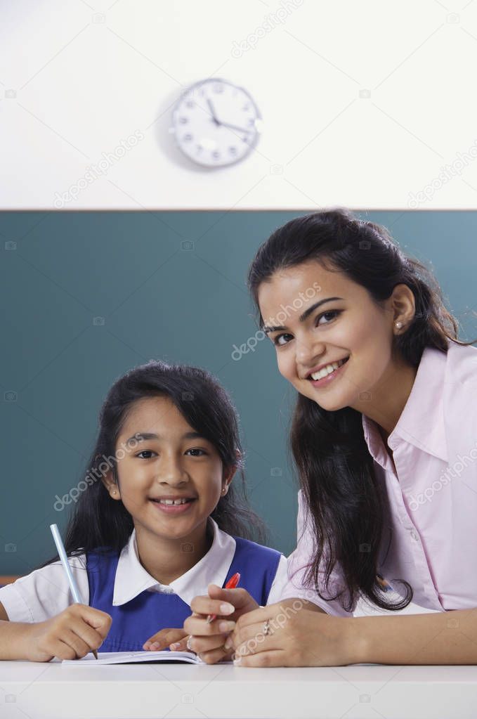 teacher and student smile