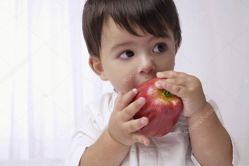little boy with apple