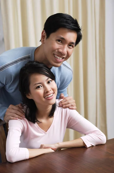 Cute woman and man at home — Stock Photo, Image