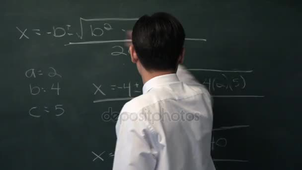MS Man writing on blackboard — Stock Video