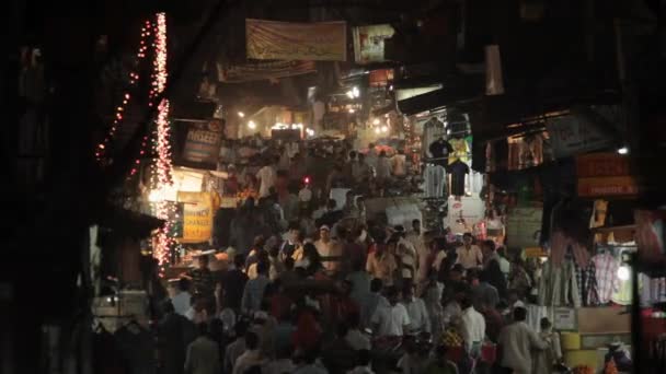 Crowded street scene at night — Stock Video