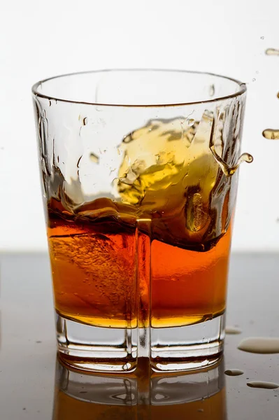 Splashing Whiskey Glass Background10 — Stock Photo, Image