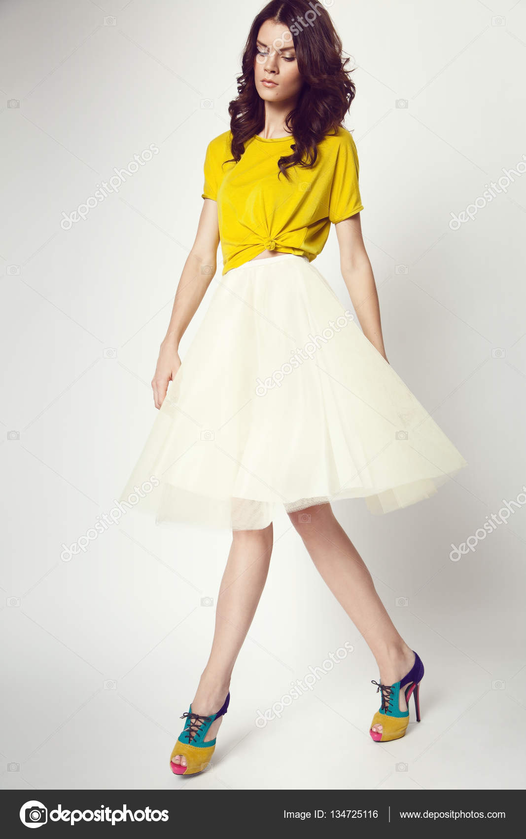 yellow top white skirt
