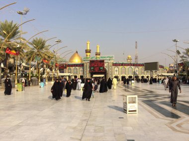 Karbala, Bagdad, Iraq, 06 09 2019: Imam Hossein's Shrine. The shrine of Prophet Abbas. Karbala and Tasoa. Walking in beinolharamein between Imam Hossein's Shrine and shrine of Prophet Abbas. clipart