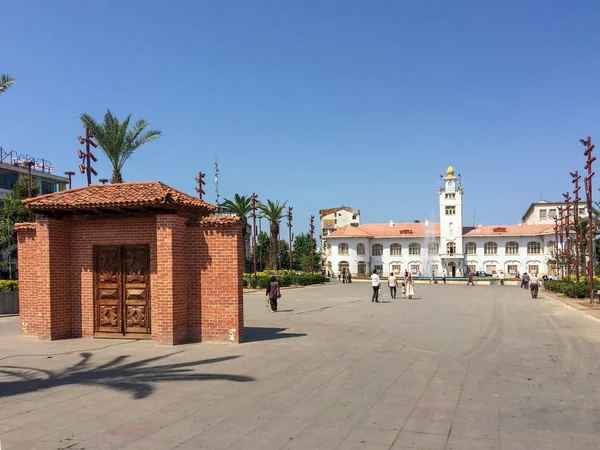 The symbolic entrance gate of Rasht city in front of Rasht municipality building in Iran. Entrance gate of Rasht city with brickwall, old wood door and Gable roof in Municipality Square.