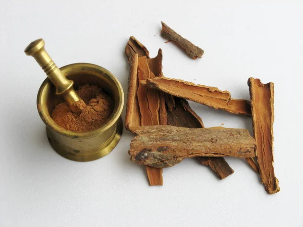 Cinnamon Stick Crushed Cinnamon Powder Brass Mortar Chinese Cinnamon Cassia Stock Picture
