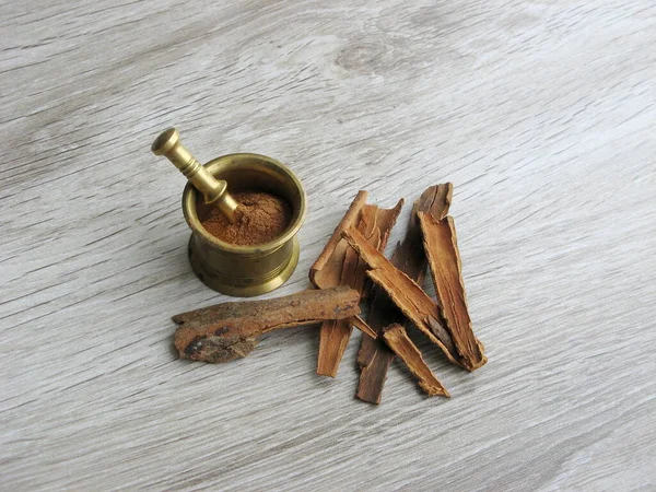 Whole Cinnamon Sticks Mortar Crushed Wooden Table Ayurveda Treatments Traditional Stock Photo