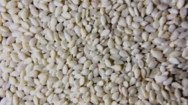 Beyaz susam tohumları makro çekim Dönüşümlü