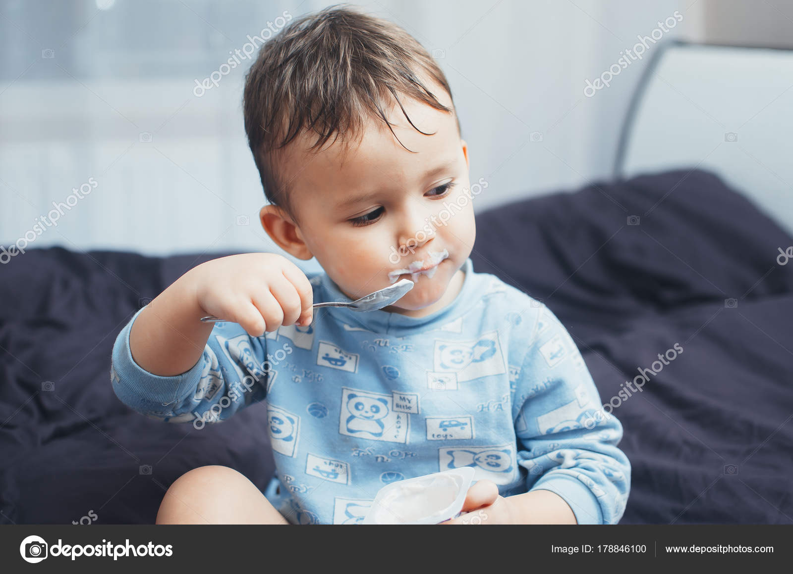 Baby Eating Cottage Cheese Before Bed Stock Photo C Komokvm