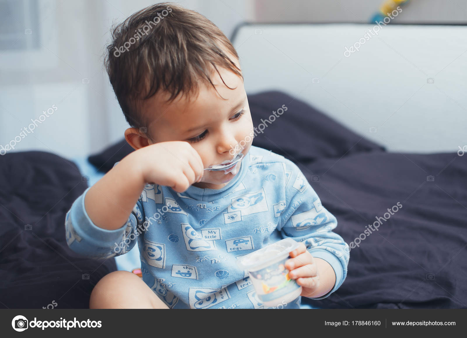 Baby Eating Cottage Cheese Before Bed Stock Photo C Komokvm