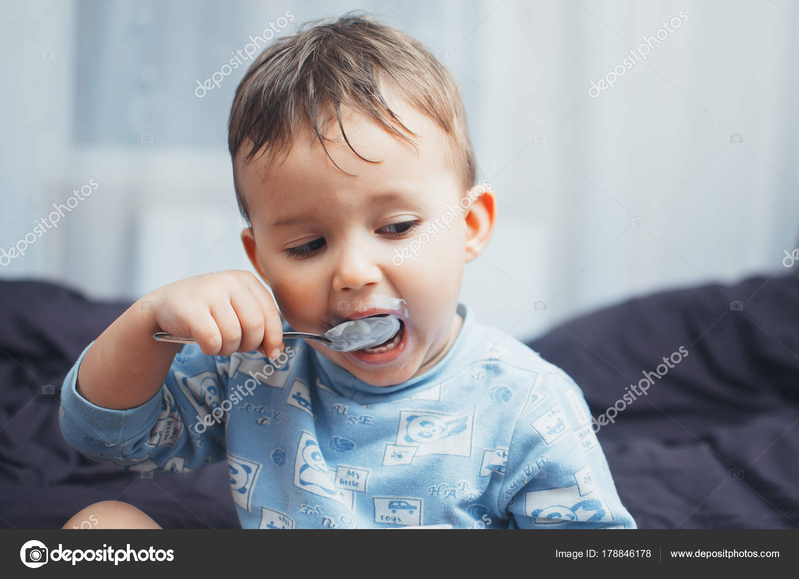 Baby Eating Cottage Cheese Before Bed Stock Photo C Komokvm